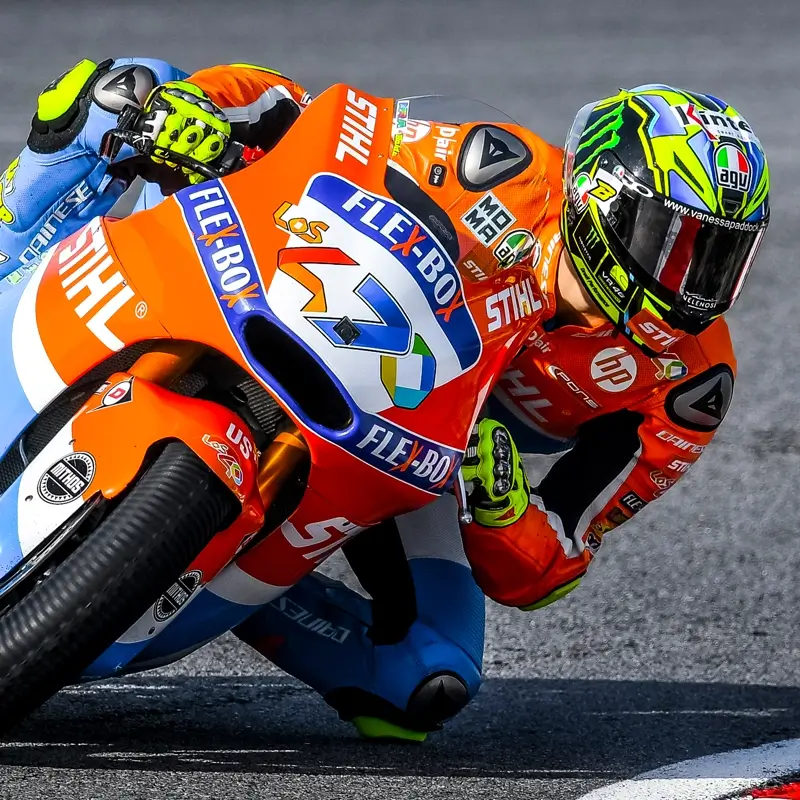 Adelaide Secures MotoGP blog - image of MotoGP bike layed down in a left hand turn photographed from the front.